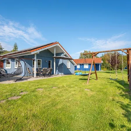 6 Personen Familienferienhaus Mit Sauna, Whirlpool Zwei Toiletten Und Kaminofen In Hébergement de vacances Otterndorf